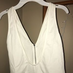 Cream colored thong bodysuit